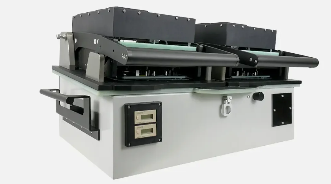 Side view of dual well in circuit test fixture.