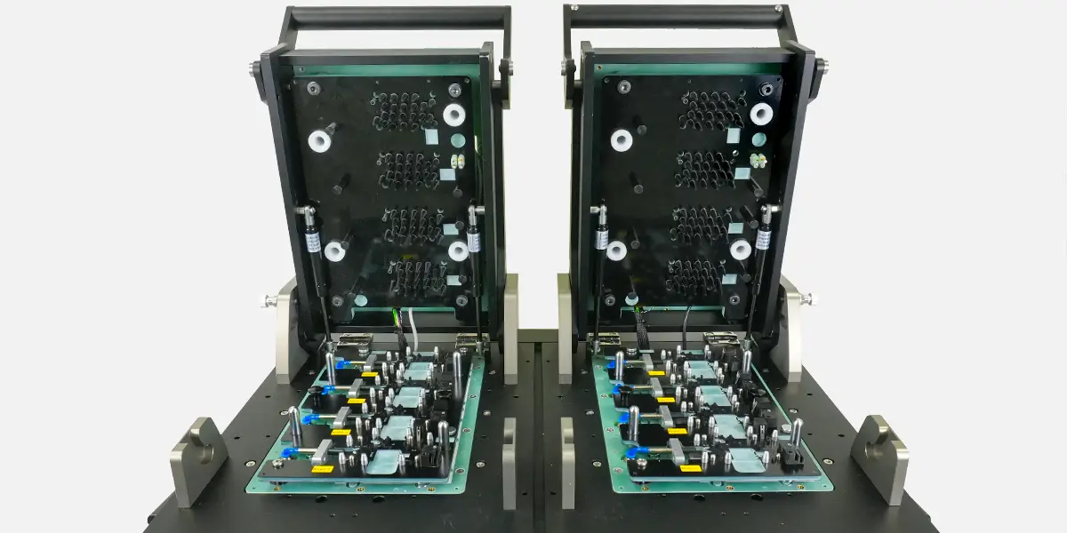 lid-components-63254-webp Dual well test fixture, both wells open, close up.