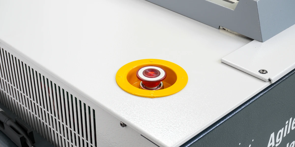 top-close-up-button View of the button on top of the Agilent ICT i3070 test system that Forwessun has refurbished.