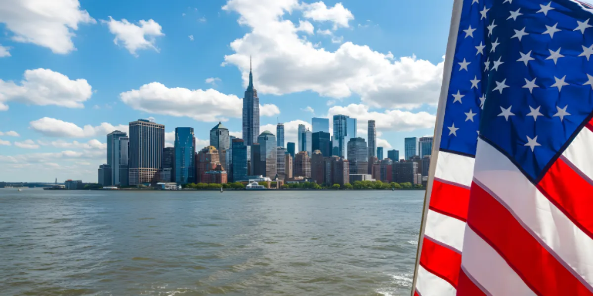 New York City skyline with the American flag.