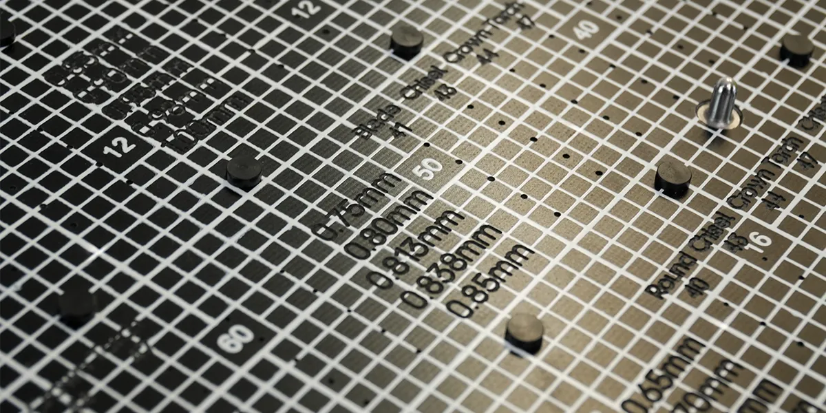 Engravings on a test fixture