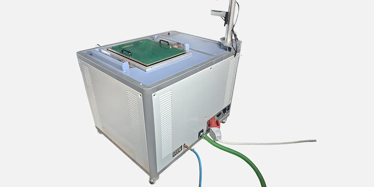 TSLH GALLERY IMAGE EXAMPLE 2: #1 Teradyne TestStation LH (TSLH) in‑circuit test system with green fixture plate mounted on top, showing mechanical alignment hardware and vented side panels.