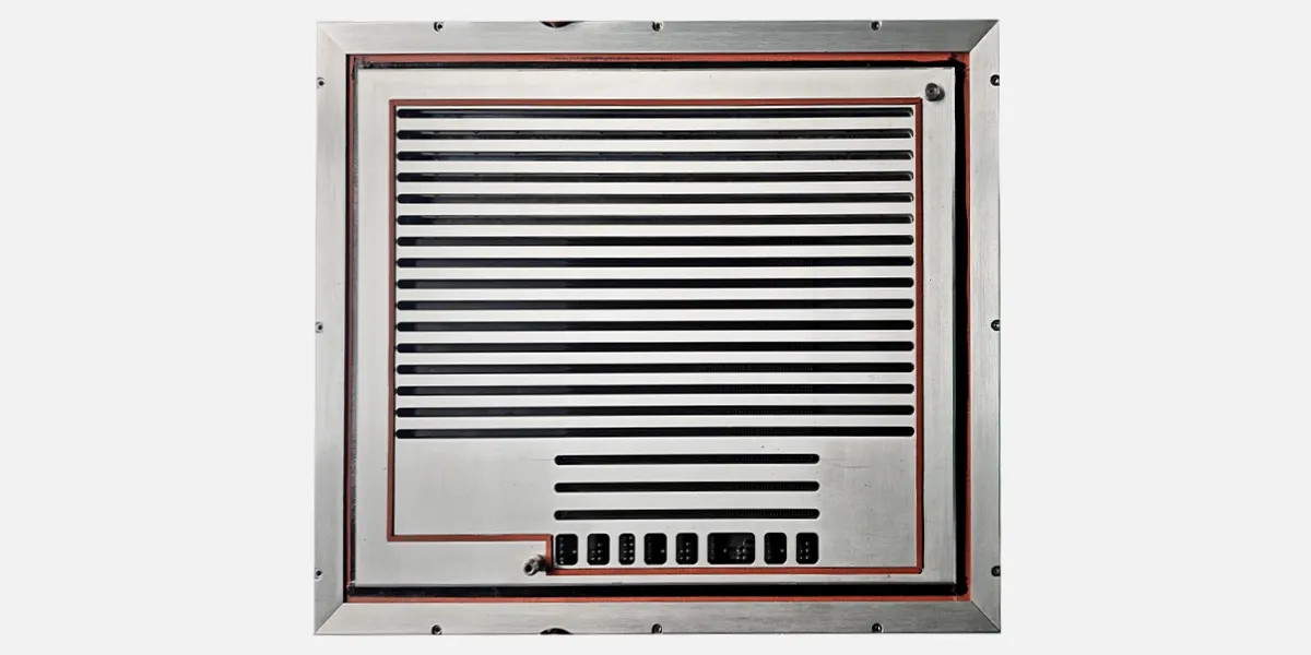 TSLH GALLERY IMAGE EXAMPLE 2: #6 Close‑up of vented metal panel from a Teradyne TestStation LH test system, showing ventilation slits, mounting screws, and red internal gasket.