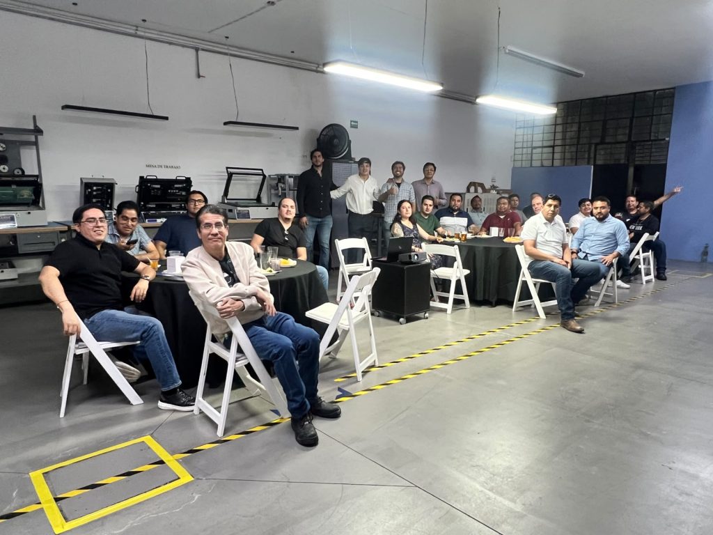 Attendees seated at round tables during the first Forwessun Connect event at Forwessun’s Guadalajara facility